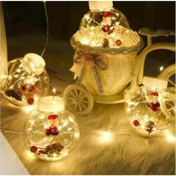 Χριστουγεννιάτικη Κουρτίνα Led 3Μ με 10 Φωτιζόμενες Διάφανες Πλαστικές Μπάλες με Άι Βασίλη, Χιόνι